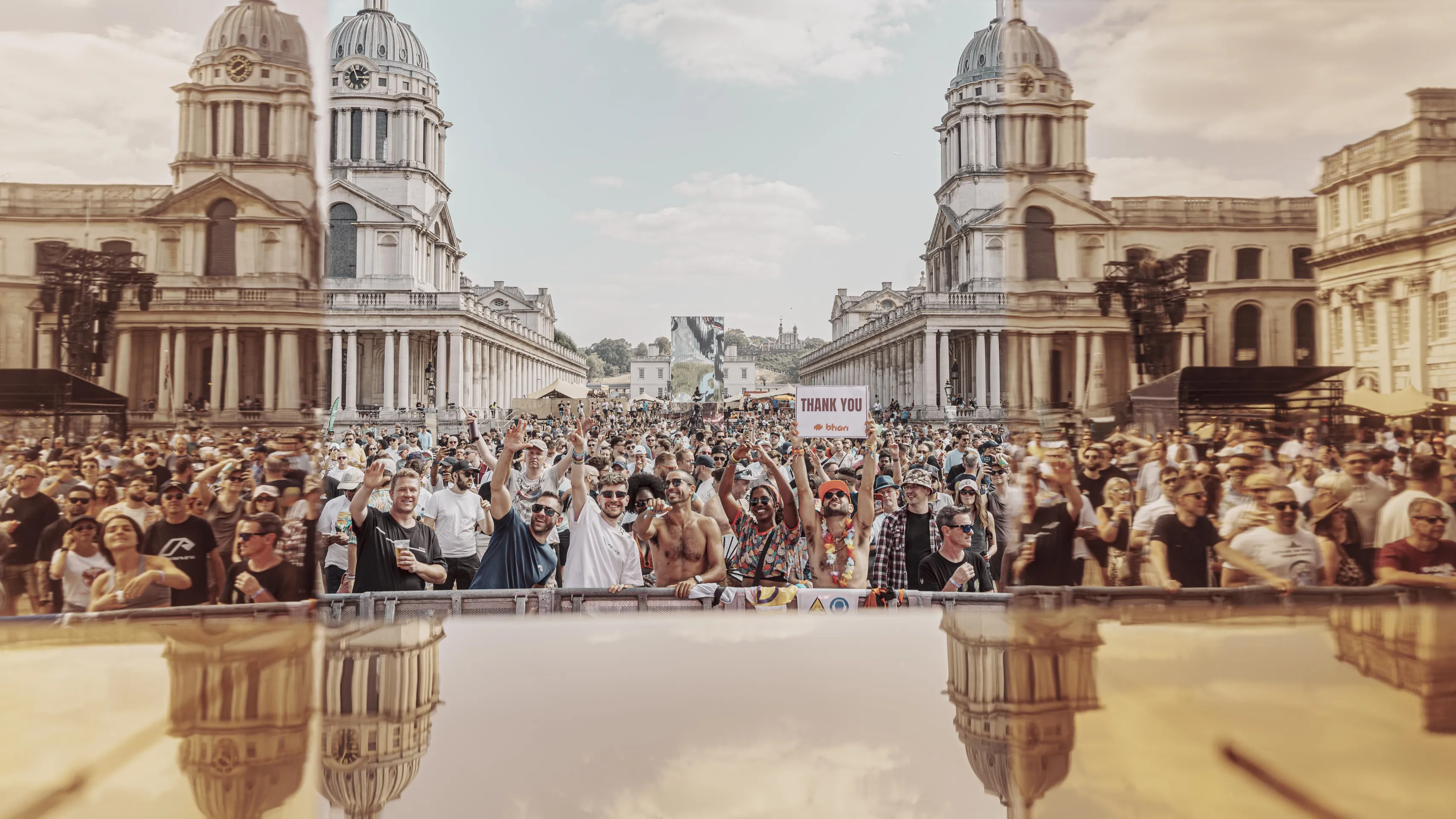 Live concert photography capturing musicians performing on stage with dynamic lighting and energetic crowd engagement.